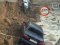 У Києві після зливи під асфальт провалилися авто
