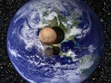 NASA опублікувала нові детальні фото Плутона і Харона