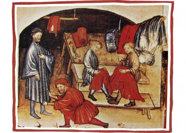   У кравецькому цеху ХVI століття. Зображення з Вікіпедії