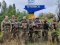 Воїни 14 ОМБр пофарбували у синьо-жовтий знак при в'їзді у звільнений Куп'янськ. ФОТО