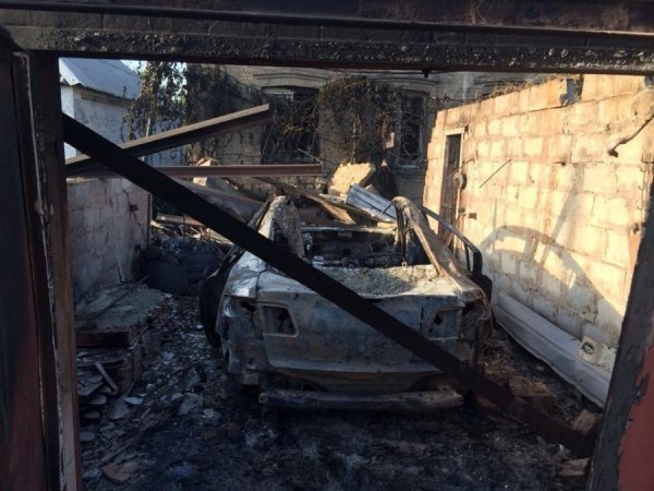Донецьк після обстрілу: зруйновані хати, спалені авто. ФОТО