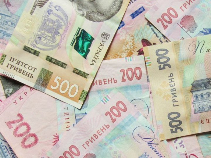 МВФ тисне на Україну: Bloomberg дізнався, чому фонд хоче девальвації гривні