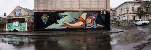 Художник, який обмалював Луцьк котами, завершив равлика. ФОТО