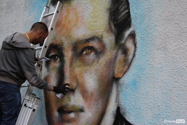 Сірі стіни луцьких будинків стали полотнами вуличних художників