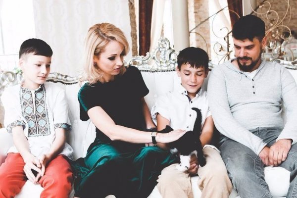 Лучанка стала хрещеною маленького безхатченка. ФОТО