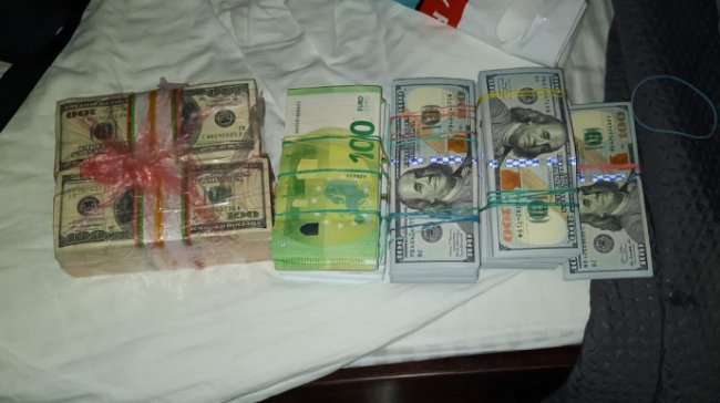 Сотні тисяч готівки та сухпайки окупантів: що виявила СБУ в УПЦ МП на Харківщині