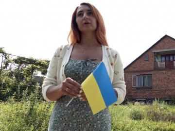 Жінка з Маріуполя проїхала 18 блокпостів окупантів з прапором України в авто. ВІДЕО 
