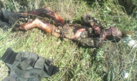 Під Луганськом знайшли обгорілі тіла чотирьох українських військових. ФОТО18+
