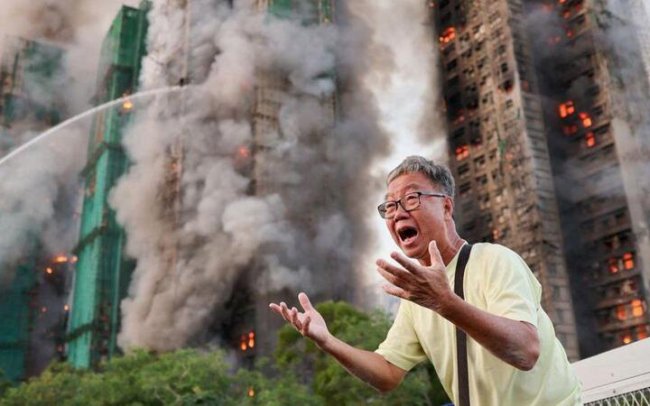 У Гонконзі - масштабна пожежа у низці багатоповерхових житлових будинків, 13 загиблих