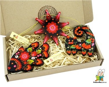 Оригінальні ялинкові прикраси – дерев’яні кулі з Петриківським розписом*