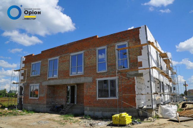 Фасадні роботи у четвертому будинку