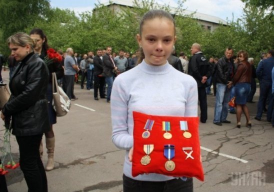 Попрощалися із жертвами російської агресії на Сході. ФОТО