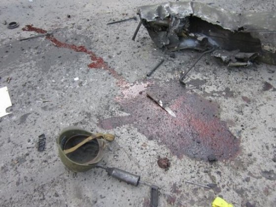 У Шахтарську бойовики фотографуються на фоні мертвих українських військових. ФОТО. ВІДЕО