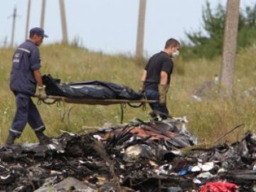 Потяг із тілами загиблих пасажирів «Боїнга-777» вирушив з місця катастрофи