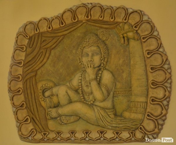 Маленький Крішна їсть масло  