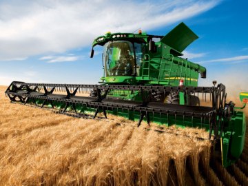 «Тітушки» обороняли комбайн: у Локачах скандал - фермер збирав врожай, який засіяли люди.ВІДЕО 