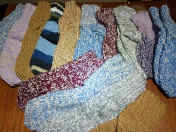 Теплі ковдри та одяг: як утеплюються лучани. ВІДЕО