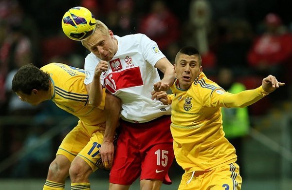 Євген Хачеріді і Артем Федецький борються з Камілом Гліком