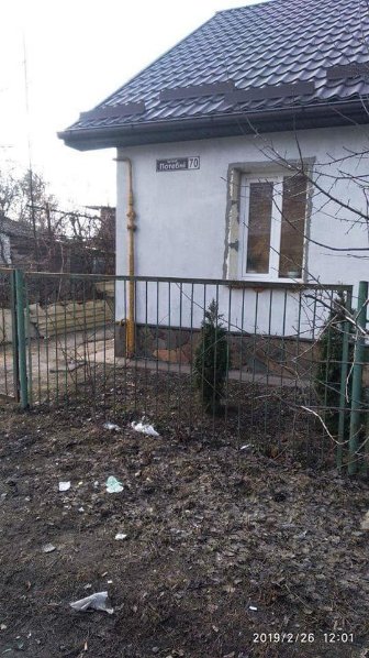 Муніципали зловили «на гарячому» лучанку, яка викидала сміття на дорогу