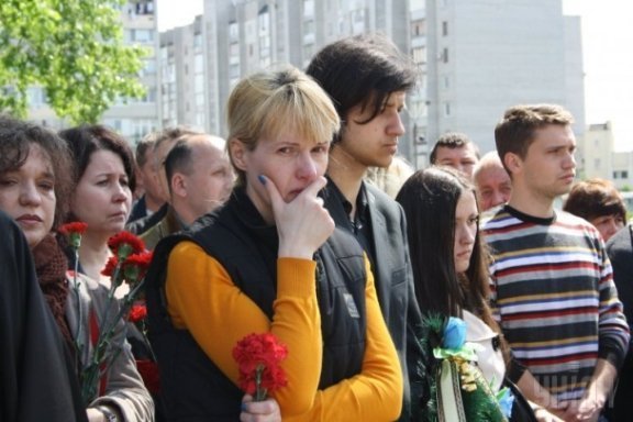 Попрощалися із жертвами російської агресії на Сході. ФОТО