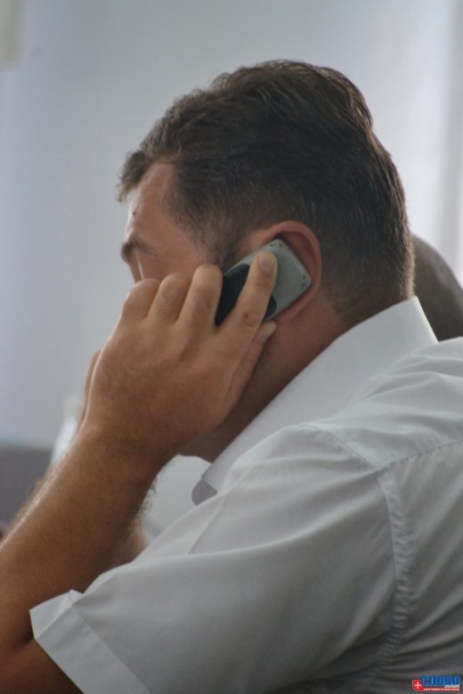 Луцькі депутати і телефони. ФОТО